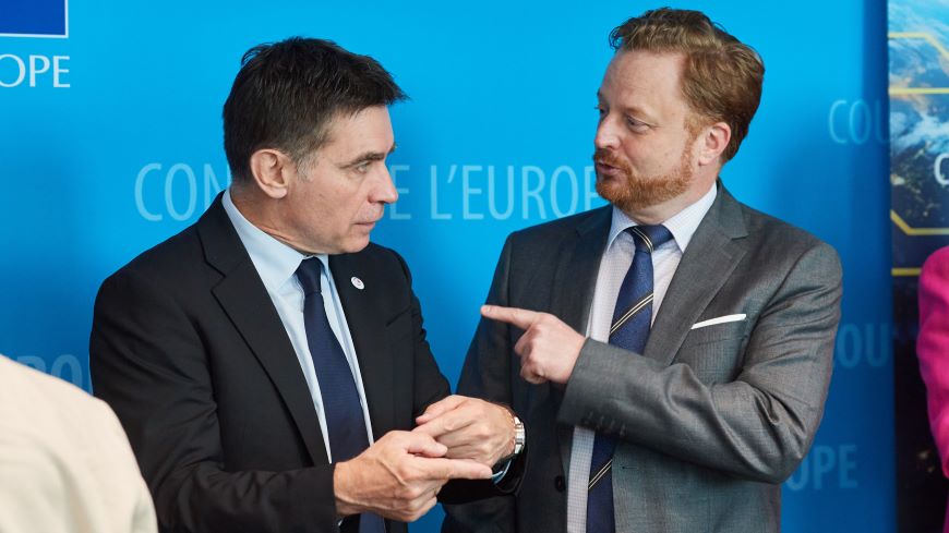 Monegasque Secretary of State for Justice Samuel Vuelta Simon (left) exchanges with the Council of Europe’s Matthias Kloth before the joint meeting