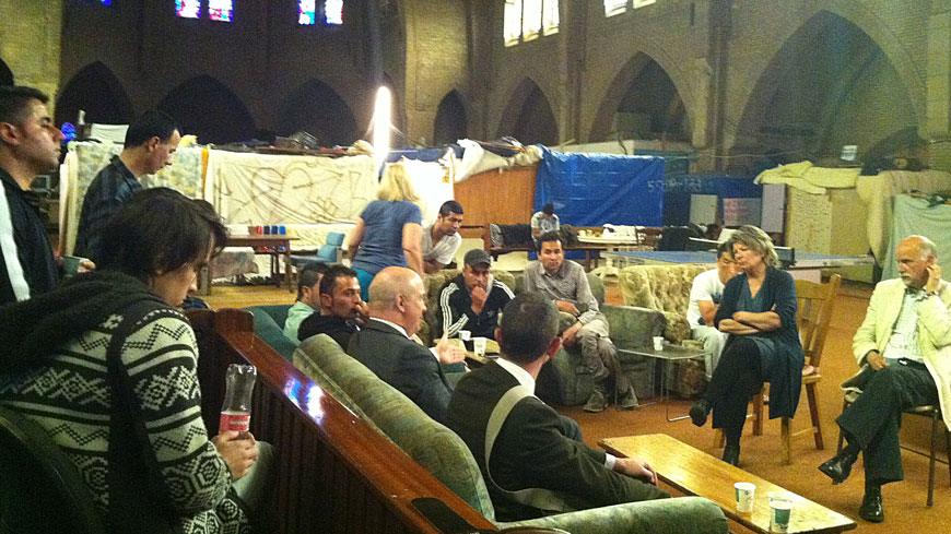 Commissioner Muižnieks visiting rejected asylum seekers camping in an empty church in The Hague in 2014